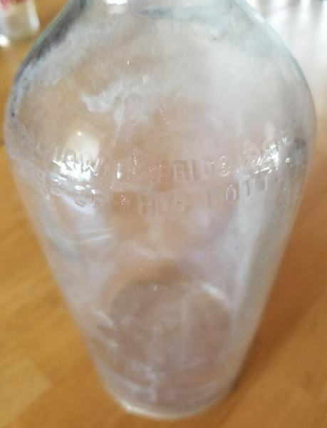 Vintage Embossed One Quart Bottle